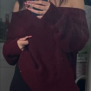 Knit sweater with open back and lacing detail